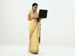 South Indian woman working on a laptop  Stock Footage