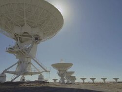 WS TU TD View of satellites dishes at Very Large Array and truck / San Augustine, New Mexico, USA   Stock Footage