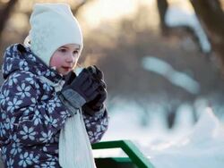 Little Girl Drinking Hot Tea in Winter Park Stock Footage