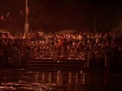 People at ritual by the river Stock Footage