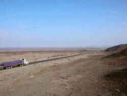 WS View of truck passing by on road / South Of Peru, Nazca, Peru Stock Footage