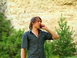 Young Man talking on the phone Stock Footage