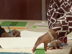 CU, PAN, Voter signing in at polling place, Toledo, Ohio, USA Stock Footage