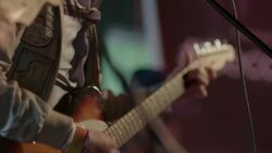 Musician plays electronic keyboard and guitarist howls into microphone on stage at South By Southwest festival Stock Footage