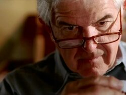  CU PAN Senior man carefully assembling fly for fly-fishing / Cleatwater, FLORIDA, USA Stock Footage