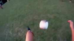 A soccer player dribbles and then kicks the ball toward the goal. Stock Footage