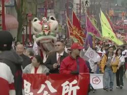 MS ZO Lion dance in streets of Chinatown AUDIO / Vancouver, British Columbia, Canada Stock Footage