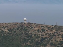 MS ZO AERIAL Shot of transmitter station on mountain with landscapes and runway / Rhodes, Dodecanese, Greece Stock Footage