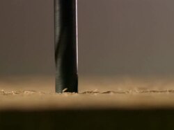 Extreme close up drilling hole with power drill Stock Footage