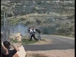 WRAP GRAPHIC PIX Palestinians clash with Israeli soldiers ADDS protests, morgue News Clip