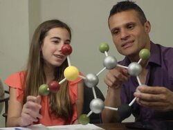 Daughter Shows Father her Science Project of a Molecule Stock Footage