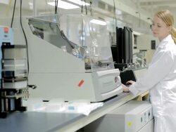 MS POV Female lab technician monitoring samples in shaking incubator at Cancer research Healthcare medicine Industry DNA sequencing Laboratory / Vancouver, BC, Canada    Stock Footage