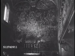 1940: SISTINE CHAPEL (Cappella Sistina): Visitors walking along marble transenna (screen) in Chapel, 'The Last Judgment' fresco by Michelangelo on alter wall, male looking at ceiling w/ binoculars, painting depicting Adam & Eve expelled from Eden. Instructional Video
