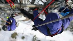 Telecommunication high workers on communication tower Stock Footage