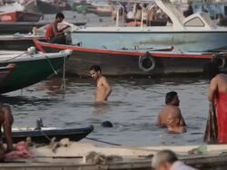 WS People bathing in Ganges / Varanasi, India Stock Footage