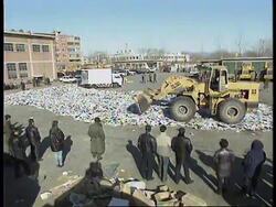 CHINA: AUTHORITIES DESTROY COUNTERFEIT TAPES AND CDS News Clip