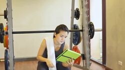 Woman using Digital tablet at gym Stock Footage