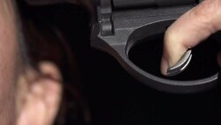 Slow Motion of Suicidal Pose With Revolver Gun Stock Footage