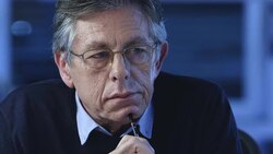 DS Senior architect in deep pondering over the plans Stock Footage