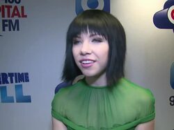 INTERVIEW - Carly Rae Jepson on playing at Wembley Stadium, losing her clothes and making music at Capital FM Summertime Ball with Vodafone on 6th June, 2015 in London, England. Stock Footage