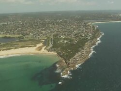 Flora and Ritchie Roberts Reserve and Curl Curl, NSW, Australia from the air Stock Footage