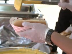 Preparing Chili Dogs At Hot Dog Festival Stock Footage