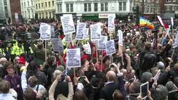 CLEAN : Demonstrators turn their backs News Clip