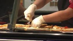 Anonymous Chefs Preparing Fast Food News Clip