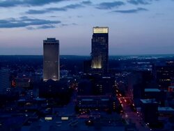 Downtown Omaha night cityscape featuring First National Tower and Woodmen Tower Stock Footage
