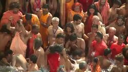 CLEAN : Hindu pilgrims take holy dip at Indias Kumbh festival News Clip