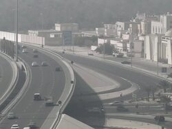HA Traffic on overpass in a smoky haze / Manama, Bahrain Stock Footage