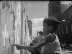 Manhattan children paint street mural Stock Footage