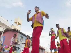 MS PAN TU TD Horse rider costume and men standing on stilts parade in Seenigama annual Perahern parade in Buddhist procession AUDIO / Sinigama, Southern Province, Sri Lanka Stock Footage