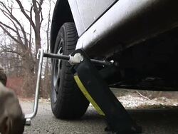 HD: Lifting Up The Broken-Down Car Stock Footage