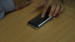 Businessman analyzing data on mobile Stock Footage