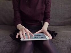 Tablet knees Stock Footage