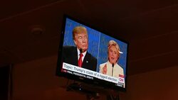 Hillary Clinton reacts after Trump is asked if he'll accept the results of the election. Debate viewers in Indiana react while watching on TV as Donald Trump and Hillary Clinton debate for the third and last time Stock Footage
