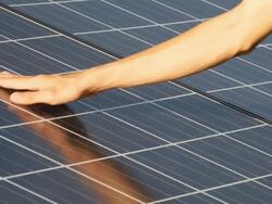 Hand touch photovoltaic panels solar field. Stock Footage