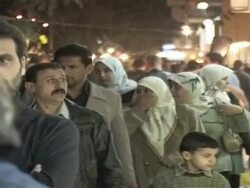Busy Baghdad market at night Stock Footage