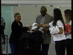 US visitors face fingerprinting and free t-shirts News Clip