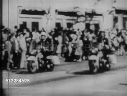 1963: JOHN F. KENNEDY ASSASSINATION: DALLAS, TEXAS: QUESTIONABLE QUALITY: WS Clock showing 12:25 PM. VS Motorcade escorting Presidential limousine w/ J.F.K.,  wife Jacqueline Kennedy, Texas Governor John Connally & wife Nellie through Dealey Plaza. TX Instructional Video