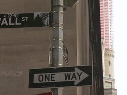 CU Signpost at Wall St. and Williams St. in NYC's financial district / New York City, New York, USA Stock Footage