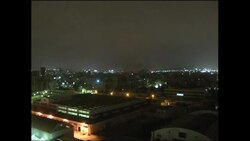 Skyline lit up orange after NATO airstrikes on capital News Clip
