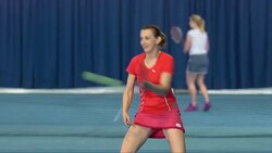 MS Female Tennis Player Hitting The Ball Stock Footage