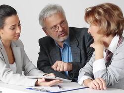 Mature Couple Meeting With Financial Advisor Stock Footage