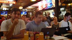 Debate viewers in Indiana react while watching on TV as Donald Trump and Hillary Clinton debate for the second time in St. Louis Stock Footage