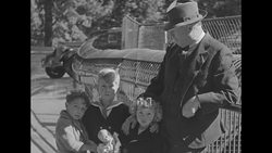 Capt. Bob Bartlett at the Bronx Zoo with walrus 'Peel' and with young children in the 1930s News Clip