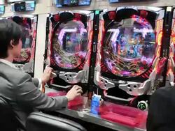 MS T/L POV Shot of people playing Pachinko machines / Tokyo, Japan Stock Footage
