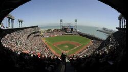 Fans watch a San Fransisco Giants game from behind the home plate at AT andT Park in San Fransisco. Stock Footage