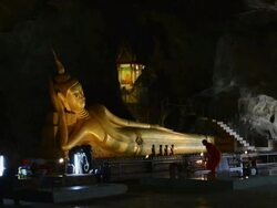 WS View of  Reclining Buddha in Cave Temple  AUDIO / Phang Naga, Phang Nga, Thanland Stock Footage